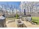 The spacious backyard features a patio with a fire pit and seating area at 8610 Fawn Way, McCordsville, IN 46055