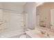 Clean, standard bathroom with a tub/shower combo, single sink vanity and neutral finishes at 8610 Fawn Way, McCordsville, IN 46055