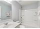 This primary bathroom features tile flooring, a sink, a mirror, a shower, and a toilet at 8610 Fawn Way, McCordsville, IN 46055