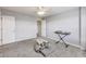 Bedroom with light grey walls, carpet, and two doors at 8610 Fawn Way, McCordsville, IN 46055