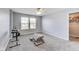 Bright bedroom featuring carpeted floors and a window with a wooded view at 8610 Fawn Way, McCordsville, IN 46055