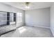 Bedroom with a window view, carpeted floors and light grey walls at 8610 Fawn Way, McCordsville, IN 46055