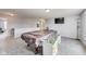 Large, versatile bonus room with tv at 8610 Fawn Way, McCordsville, IN 46055