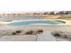 Enjoy the community's private pool overlooking a serene lake with neighborhood vistas at 8610 Fawn Way, McCordsville, IN 46055