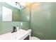 Contemporary half bathroom with sleek fixture and modern design at 8829 Depot Dr, Indianapolis, IN 46217