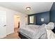 Comfortable bedroom with an open closet at 8829 Depot Dr, Indianapolis, IN 46217