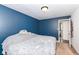 Comfortable bedroom with a full sized bed at 8829 Depot Dr, Indianapolis, IN 46217