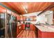 Modern kitchen with stainless steel appliances and stylish wood cabinets and countertops at 8829 Depot Dr, Indianapolis, IN 46217