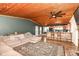 Open-concept space with a cozy living room flowing into a breakfast bar and kitchen at 8829 Depot Dr, Indianapolis, IN 46217