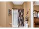 Bathroom features a shower with a curtain, toilet, and access to the bedroom through an arched doorway at 9255 W 30Th St, Indianapolis, IN 46234