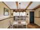 Bright dining room with a decorative chandelier, hardwood floors, and vintage décor at 9255 W 30Th St, Indianapolis, IN 46234