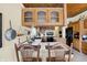 This kitchen features wood cabinets, a breakfast bar, and up-to-date appliances at 9255 W 30Th St, Indianapolis, IN 46234