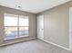 Serene bedroom with a large window offering natural light and a neutral color palette at 9464 Fordham St, Indianapolis, IN 46268