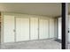 Outdoor storage space featuring white panel doors with gray trim at 9464 Fordham St, Indianapolis, IN 46268