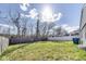 A private backyard area with a combination of wood and white vinyl fencing at 9525 Meadowlark Dr, Indianapolis, IN 46235