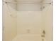 This bathroom features a white tub shower at 9525 Meadowlark Dr, Indianapolis, IN 46235