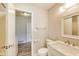 This bathroom features a sink and vanity with gray walls at 9525 Meadowlark Dr, Indianapolis, IN 46235