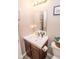 Well-lit bathroom with a modern vanity, sleek mirror, and fresh decor, creating a clean and inviting space at 9752 Brook Wood Dr, McCordsville, IN 46055