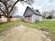 Exterior image displaying a yard and the back of a quaint, one-story home at 980 Edgemont Ave, Indianapolis, IN 46208