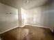 This interior shot showcases an empty bedroom, ready for decor and personalization at 980 Edgemont Ave, Indianapolis, IN 46208