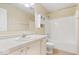 Bright bathroom featuring a vanity with cabinets, and a shower-tub combination at 9856 Commonwealth Dr, Fishers, IN 46038