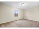 Comfortable carpeted bedroom featuring a window that fills the room with natural light at 9856 Commonwealth Dr, Fishers, IN 46038