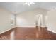 Bright living room featuring hardwood floors, and a vaulted ceiling, and filled with natural light at 9856 Commonwealth Dr, Fishers, IN 46038