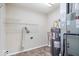 Functional utility room featuring water heater, furnace and storage options for efficiency at 9856 Commonwealth Dr, Fishers, IN 46038