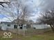 Spacious backyard with a wooden fence and an outdoor seating area at 11522 N 450 W, Alexandria, IN 46001