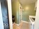 Laundry room featuring tile floor, neutral paint, and laundry machine at 11522 N 450 W, Alexandria, IN 46001
