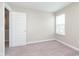 Bright bedroom featuring plush carpet and a window for natural light at 1239 Newton St, Avon, IN 46123