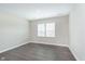 Bright bedroom featuring modern flooring and a window for natural light at 1239 Newton St, Avon, IN 46123