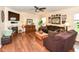 Comfortable living room with hardwood floors, a fireplace, and stylish decor at 14060 Princewood Dr, Fishers, IN 46037