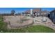 Spacious backyard with a firepit, a slide, two gazebos, stone features, and lush green grass at 1471 S Frog Pond Ct, Greenfield, IN 46140