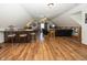 Large bonus room with a bar, multiple seating areas, and an open layout at 1471 S Frog Pond Ct, Greenfield, IN 46140