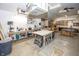 Spacious garage features work tables, equipment, and an air filtration system at 1471 S Frog Pond Ct, Greenfield, IN 46140