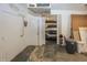 Attached two car garage featuring white doors, a furnace, and utility storage at 1471 S Frog Pond Ct, Greenfield, IN 46140