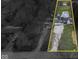 Overhead perspective of the property, highlighting the house and large backyard at 1707 Rocky Ford Rd, Columbus, IN 47203