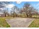 Concrete basketball court in the backyard offers space for recreational activities at 1707 Rocky Ford Rd, Columbus, IN 47203