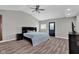 Bright bedroom with vaulted ceiling, hardwood floors, and neutral paint at 1707 Rocky Ford Rd, Columbus, IN 47203
