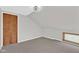 Bedroom has carpet floors, neutral paint, closet, and window for natural light at 1707 Rocky Ford Rd, Columbus, IN 47203