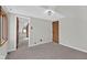 Bedroom has carpet floors, neutral paint, closet, and angled ceilings at 1707 Rocky Ford Rd, Columbus, IN 47203