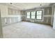 Unfinished bedroom with three windows letting in lots of natural light at 20598 Chatham Creek Dr, Westfield, IN 46074