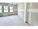 Unfinished bedroom featuring natural light, black window frames and neutral paint at 20598 Chatham Creek Dr, Westfield, IN 46074