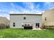 Spacious backyard showcasing a well-maintained lawn, hot tub, and patio area for outdoor enjoyment at 2180 Olympia Dr, Franklin, IN 46131
