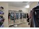 A walk-in closet with ample storage space, metal shelves, and hanging rods to keep your wardrobe organized at 2180 Olympia Dr, Franklin, IN 46131