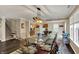 Spacious dining room with views to the kitchen, living areas, and lots of natural light at 2180 Olympia Dr, Franklin, IN 46131