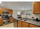 Functional kitchen featuring stainless steel appliances and bright lighting at 2180 Olympia Dr, Franklin, IN 46131