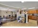 Open concept kitchen with a view to the dining room and living room at 2180 Olympia Dr, Franklin, IN 46131
