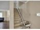 Carpeted staircase with an installed chairlift at 2180 Olympia Dr, Franklin, IN 46131